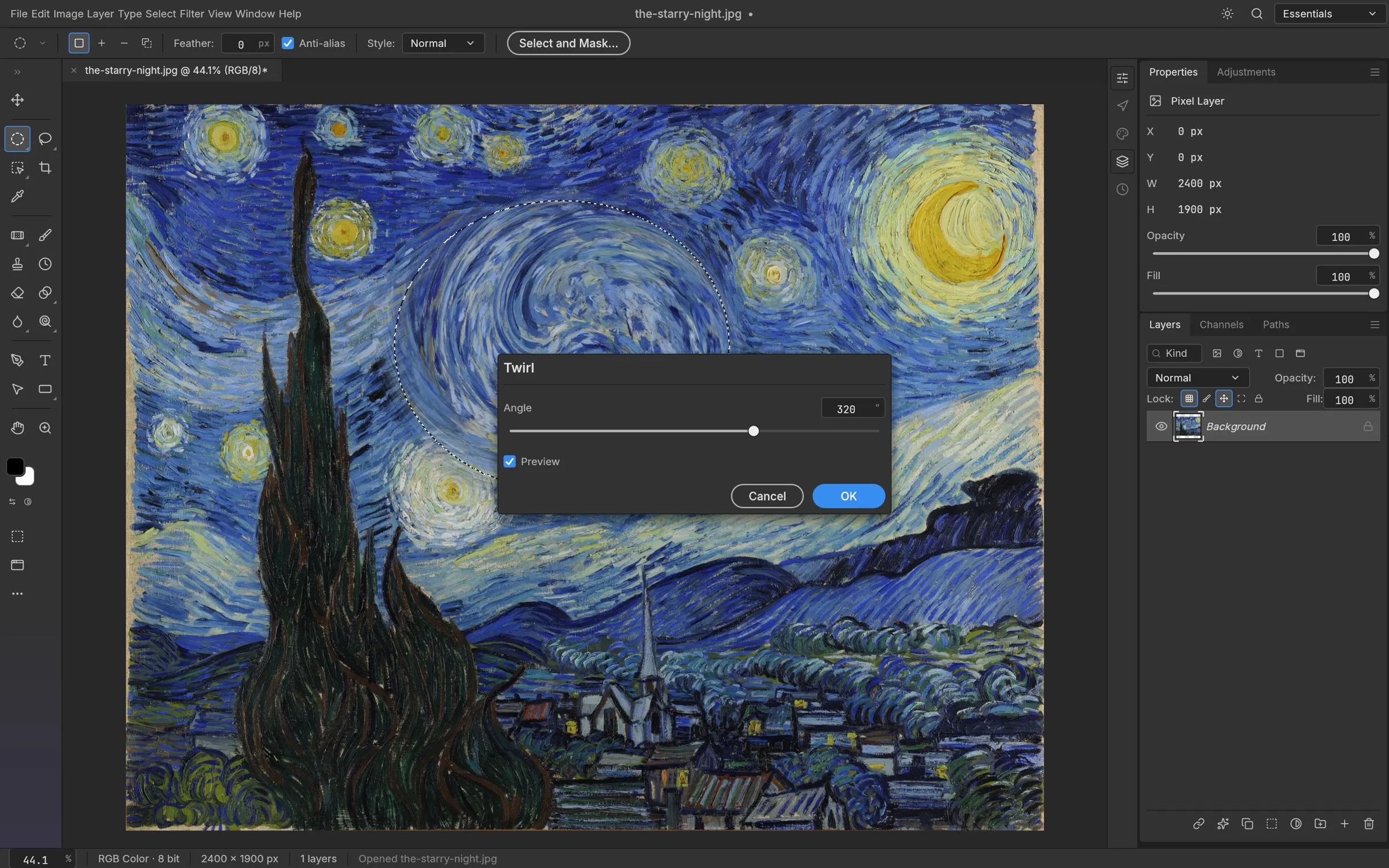 The Twirl filter dialog at a 320 degree angle, previewing live inside an elliptical selection on Van Gogh’s The Starry Night
